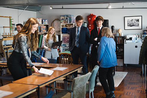 Gorter (left) prepares for her Clifton Builder consulting team's presentation to Echo Collective, a nonprofit supporting refugee and immigrant women as entrepreneurs. .
